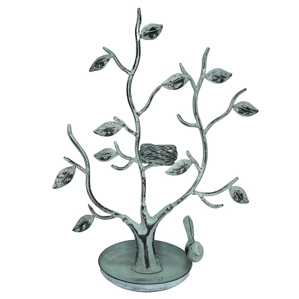Metal jewelry organizer tree with a distressed patina finish